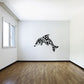 Tribal dolphin wall decal with ornate black patterned fins and tail