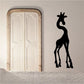Giraffe decal with black defensive pose silhouette, raised tail, small horns