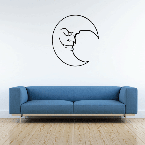 Demonic moon wall decal with black outlined face and horns.