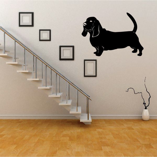 Black basset hound dog decal with long ears and tail.