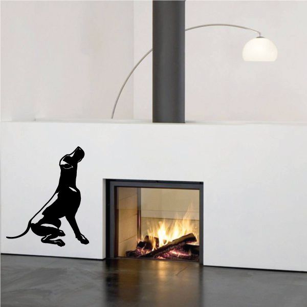Black Great Dane begging decal for wall near a fireplace