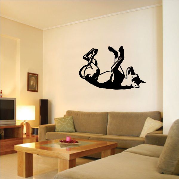 Black Doberman Pinscher belly-rub wall decal of a dog lying on its back