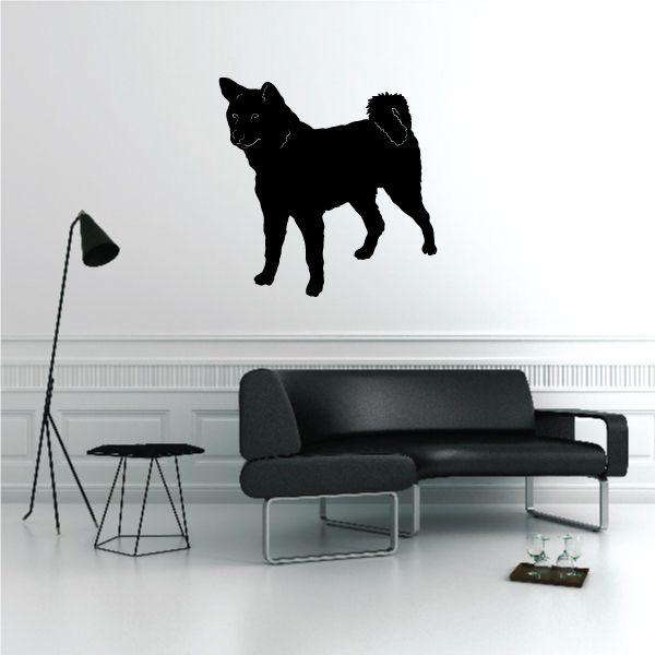 Black Alaskan Malamute decal of a standing dog silhouette, head turned left