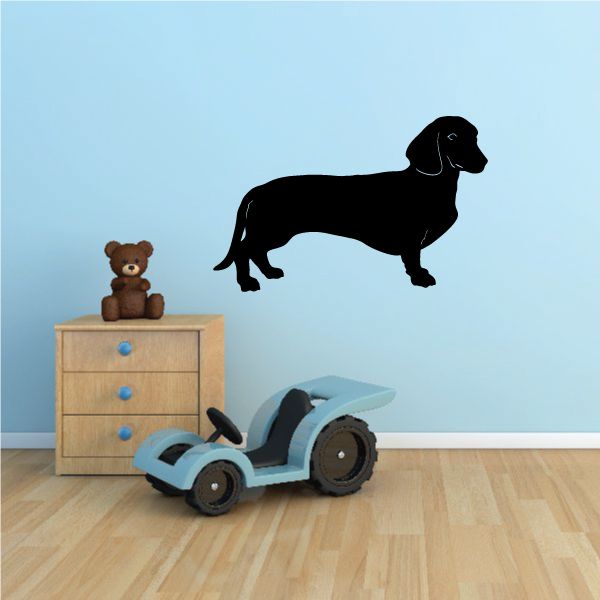 Black dachshund decal silhouette with long body and short legs