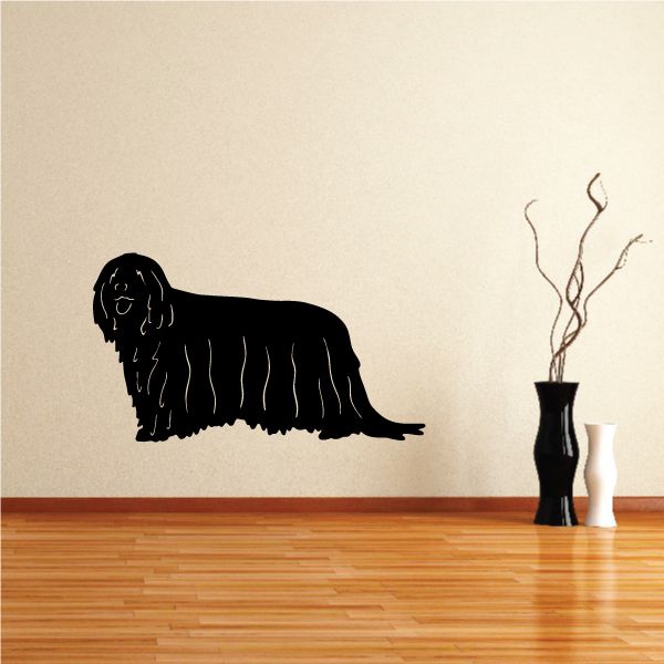 Black Komondor dog decal, side profile of a lying dog silhouette