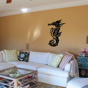 Sea horse wall decal with detailed black outline on a light surface