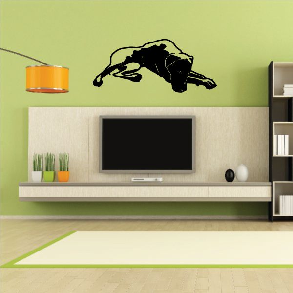 Detailed tired Great Dane wall decal, black dog lying stretched out.