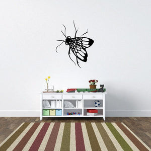 Detailed winged fly wall decal with black and white patterns