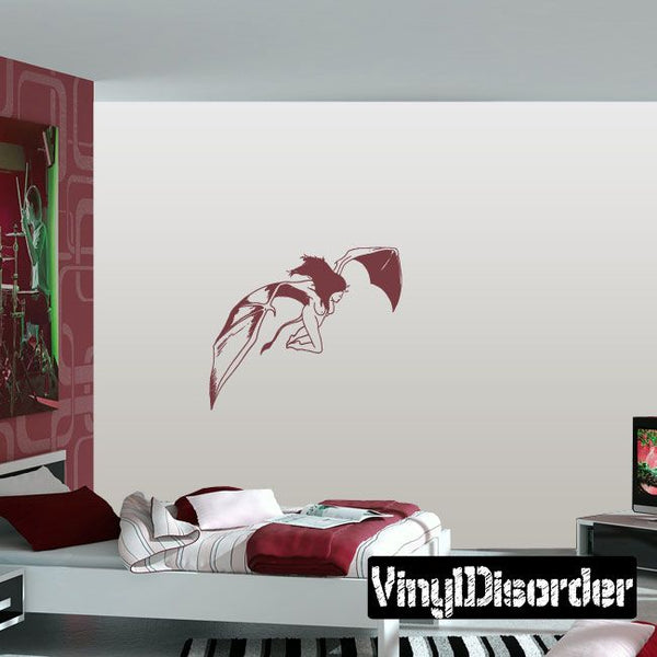 Bed set with striped pillowcases and dark red blanket