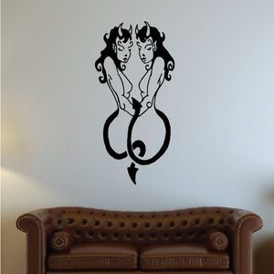 Devil girls decal, black silhouette of two horned female figures with flames and tails