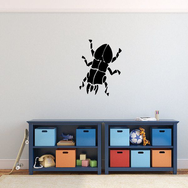 Horned beetle decal with bold diagonal accents, black silhouette
