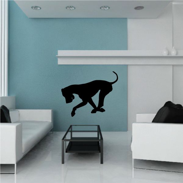 Great Dane digging wall decal with black silhouette of a pawing dog