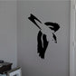 Black diving swallow silhouette decal with spread wings and curved tail