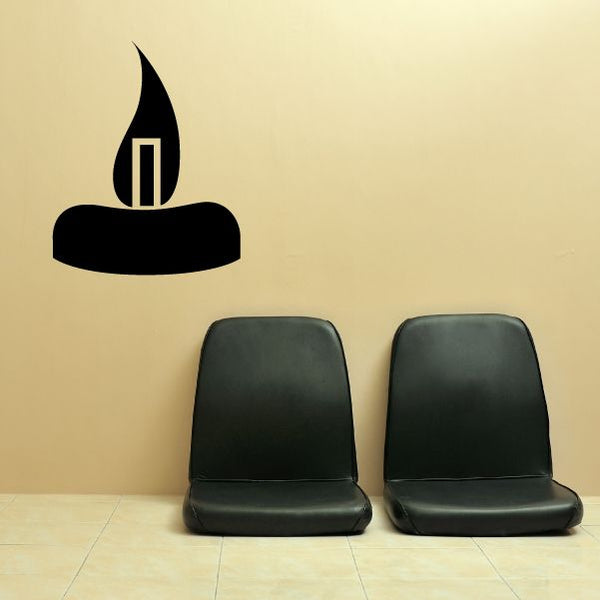 Flaming candle wall decal with black candle and yellow-orange flame