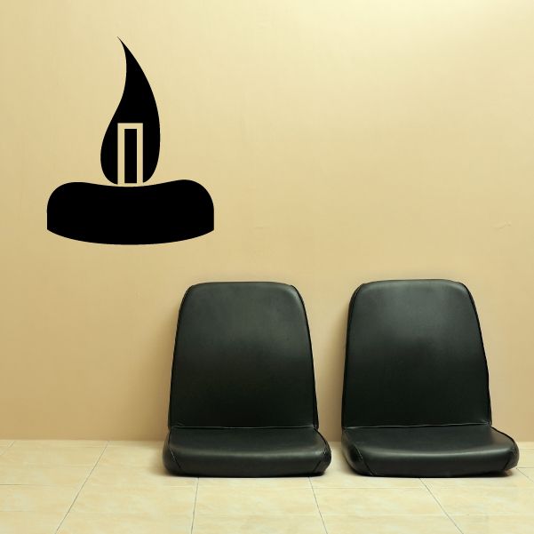 Flaming candle wall decal with black candle and yellow-orange flame