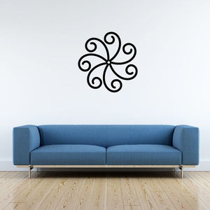 Black swirl floral wall decal with five curled petals and central dot