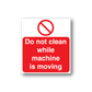 Warning sticker with red text: 'Do not clean while machine is moving'