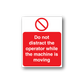 Warning sticker with red Do not distract the operator while the machine is moving