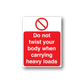 Warning sticker with red “Do not twist your body when carrying heavy loads” text