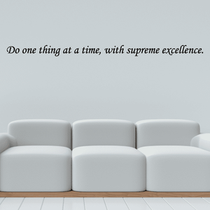 Cursive wall decal: “Do one thing at a time, with supreme excellence.”
