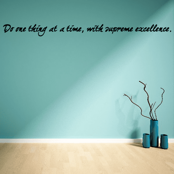 Wall decal with cursive quote: Do one thing at a time, with supreme excellence.