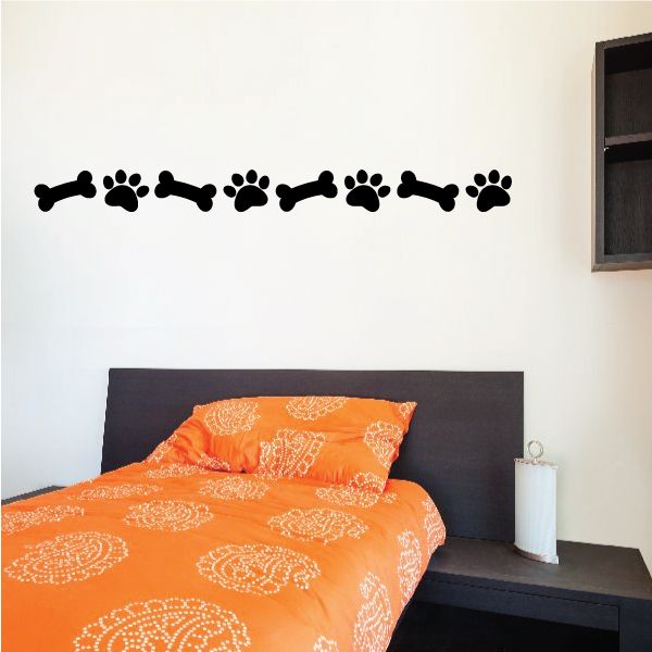 Dog bones and paw print border decal, black repeating horizontal row of bones and paws
