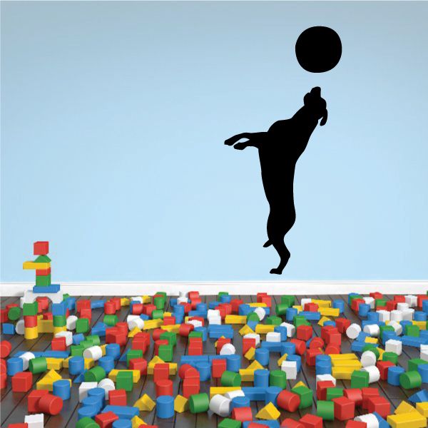 Bouncing dog ball decal, black silhouette of dog jumping with ball above