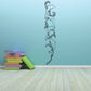 Dolphin and seaweed wall decal with cascading line-art figures, vertical design