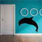 Black dolphin high-dive silhouette decal with three white bubble rings