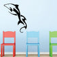 Black dolphin making waves wall decal with fin and splash swirl