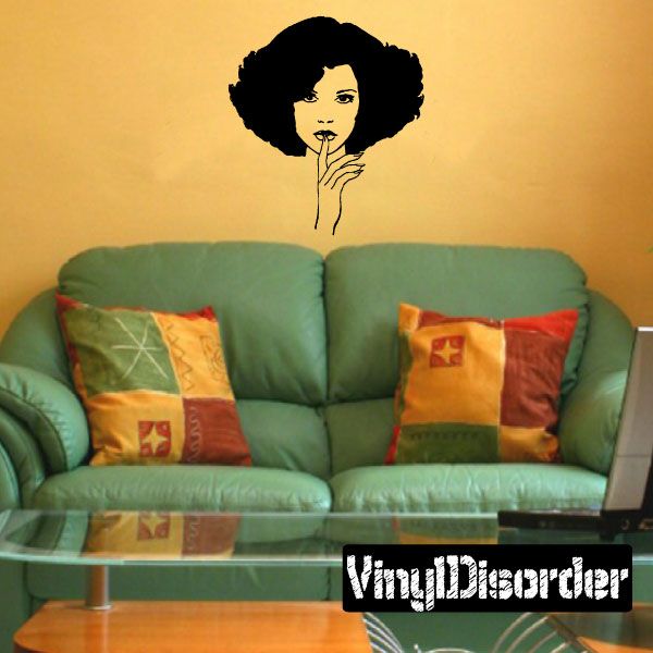 Wall decal featuring a black-and-white woman face with an afro, hand under chin