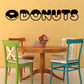 Donuts wall decal with large black donut word art spelling DONUTS