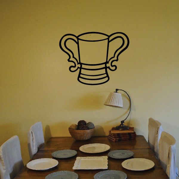 Double-handle stein wall decal with black outline mug and two curved handles.