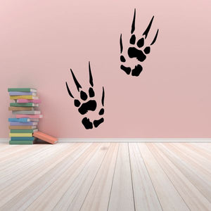 Dragon footprint decal with three dark paw prints and claw marks