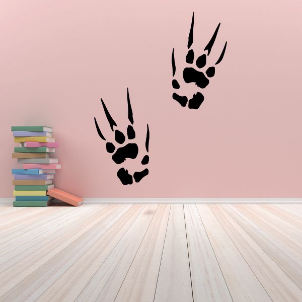 Dragon footprint decal with three dark paw prints and claw marks