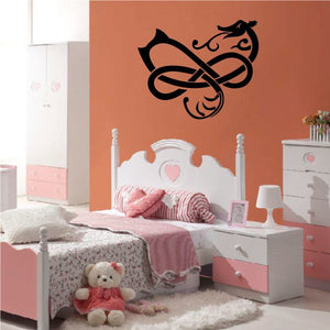 Tribal dragon wall decal in black vinyl, decorative swirl design.