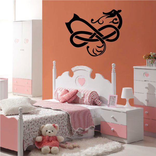 Tribal dragon wall decal in black vinyl, decorative swirl design.
