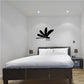 Dragonfly landing wall decal in black with landing wings and small feet detail