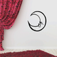 Crescent moon decal, black outline with small face profile