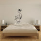 Goose wall decal in black line-art style, perched with a small hat and bow