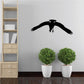 Black crow silhouette wall decal, wings spread and beak forward, perched in arc.