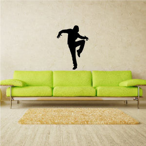 Vinyl wall decal of a black dancer silhouette, dancing pose