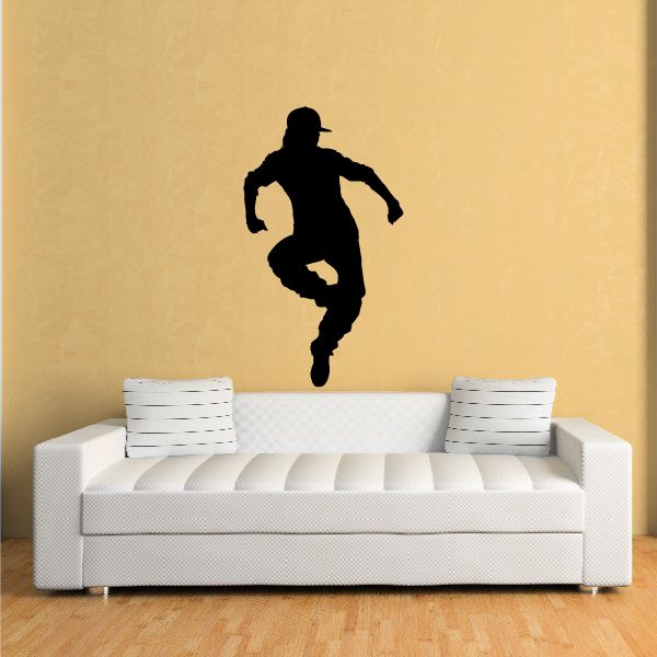 Vinyl wall decal of a black running dancer silhouette
