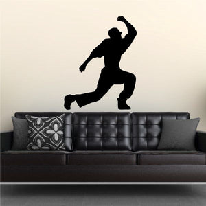 Vinyl wall decal of black dancer silhouette with raised arm