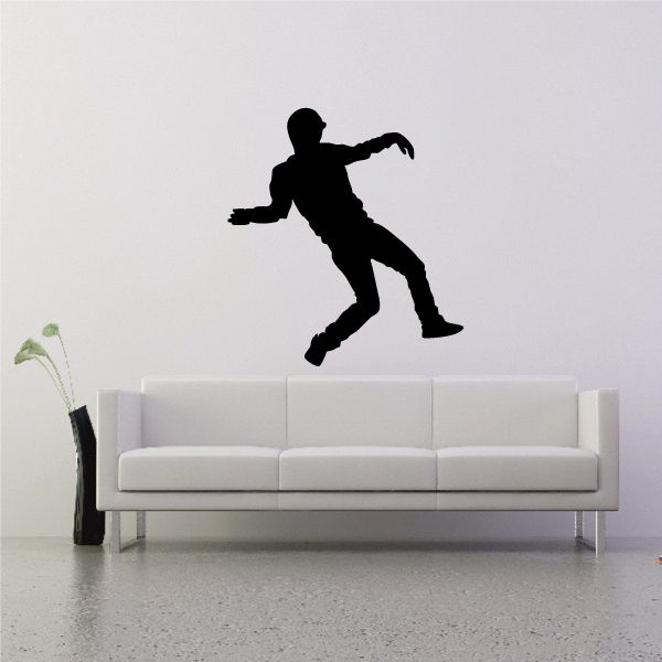 Vinyl wall decal of a black dancer silhouette on the wall