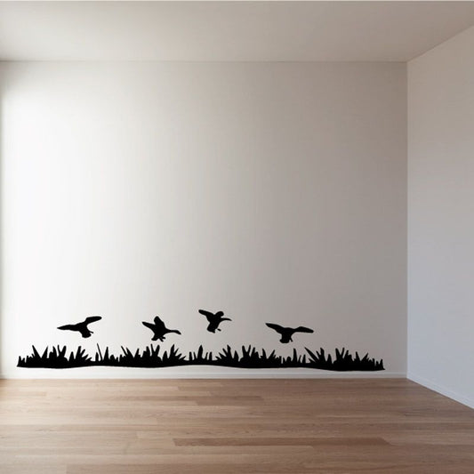 Image of Ducks Hovering Above Grass Decal