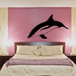 Dolphin wall decal with black silhouette and light underside markings