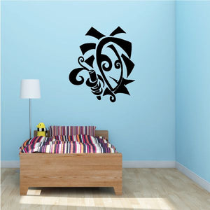 Black graffiti-style trickster face wall decal with ornamental swirls.