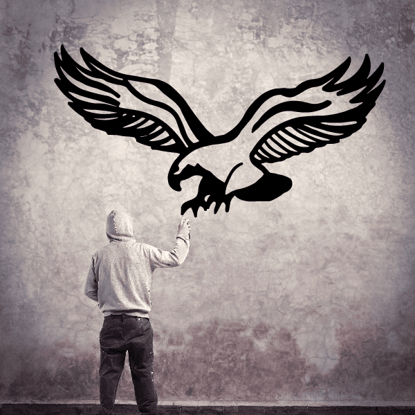 Eagle decal with black eagle silhouette and white outline wings spread