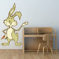 Easter bunny sticker with raised paw, smiling face, and carrot